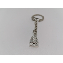 Ezüst kulcskarikára fűzött kulcstartó ezüstszínű városos medállal.