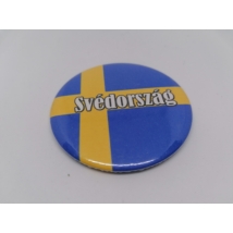 Köralakú hűtőmágnes zászlóval, fehér Svédország felirattal.